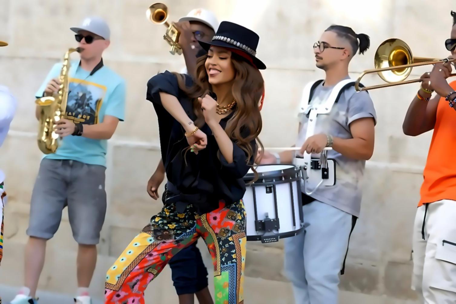 Jazz dance students practicing technique in studio environment with instructor feedback